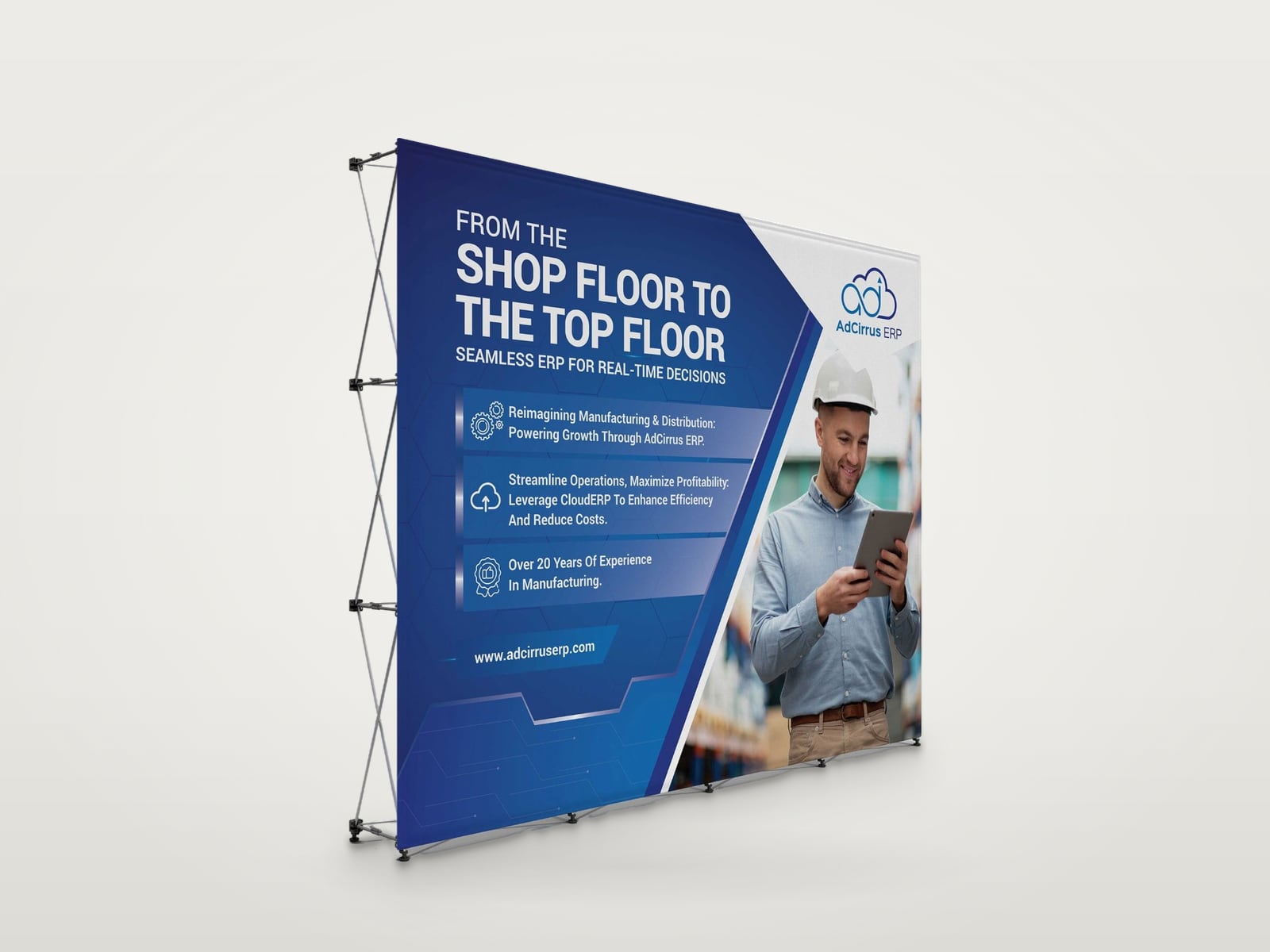 AdCirrus ERP pop-up backdrop headed From the shop floor to the top floor, with three benefit panels and a photo of a worker holding a tablet, shown on a 3D mockup