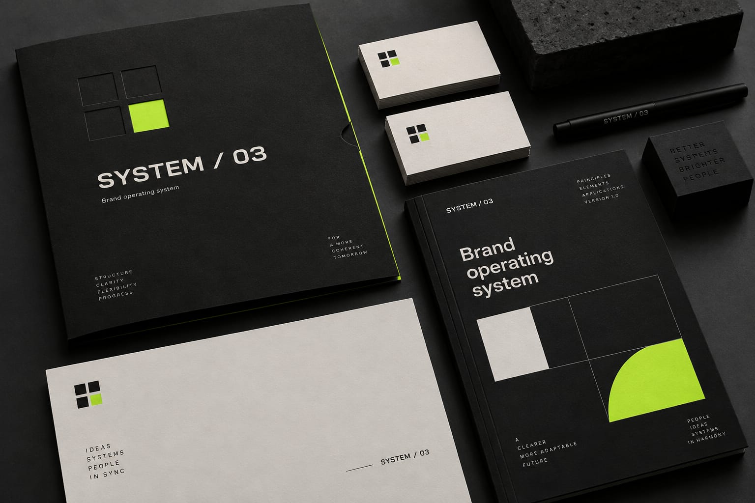 AI-generated concept of SYSTEM / 03 stationery: a black folder, ivory business cards and a guidelines booklet with an electric lime accent